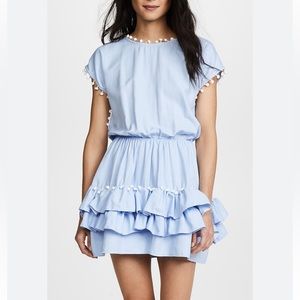 Little Peixoto girls Nissi blue white pom pom dress